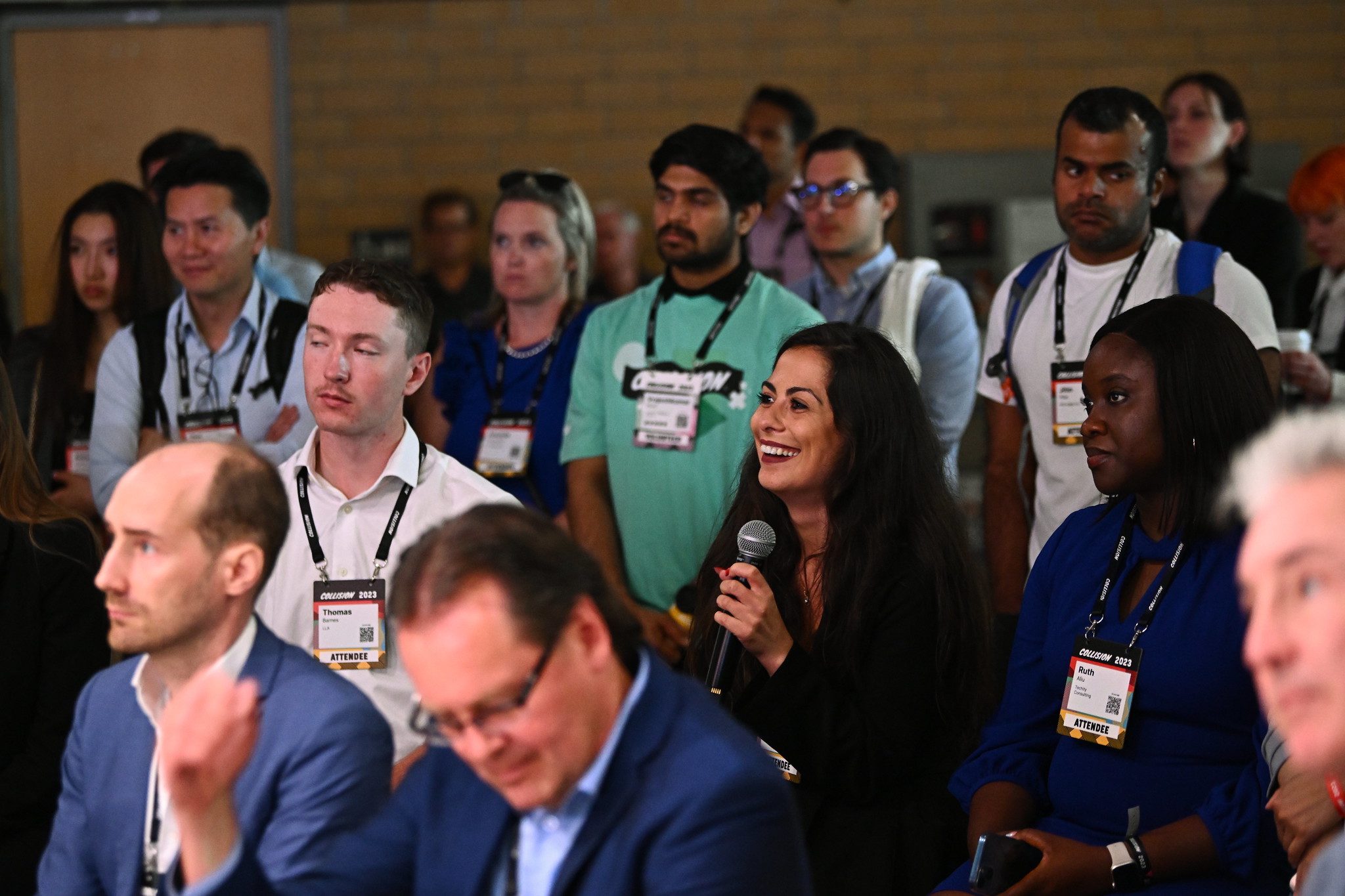 Attendees at Q&A stage during day one of Collision 2023 at Enercare Centre in Toronto, Canada.