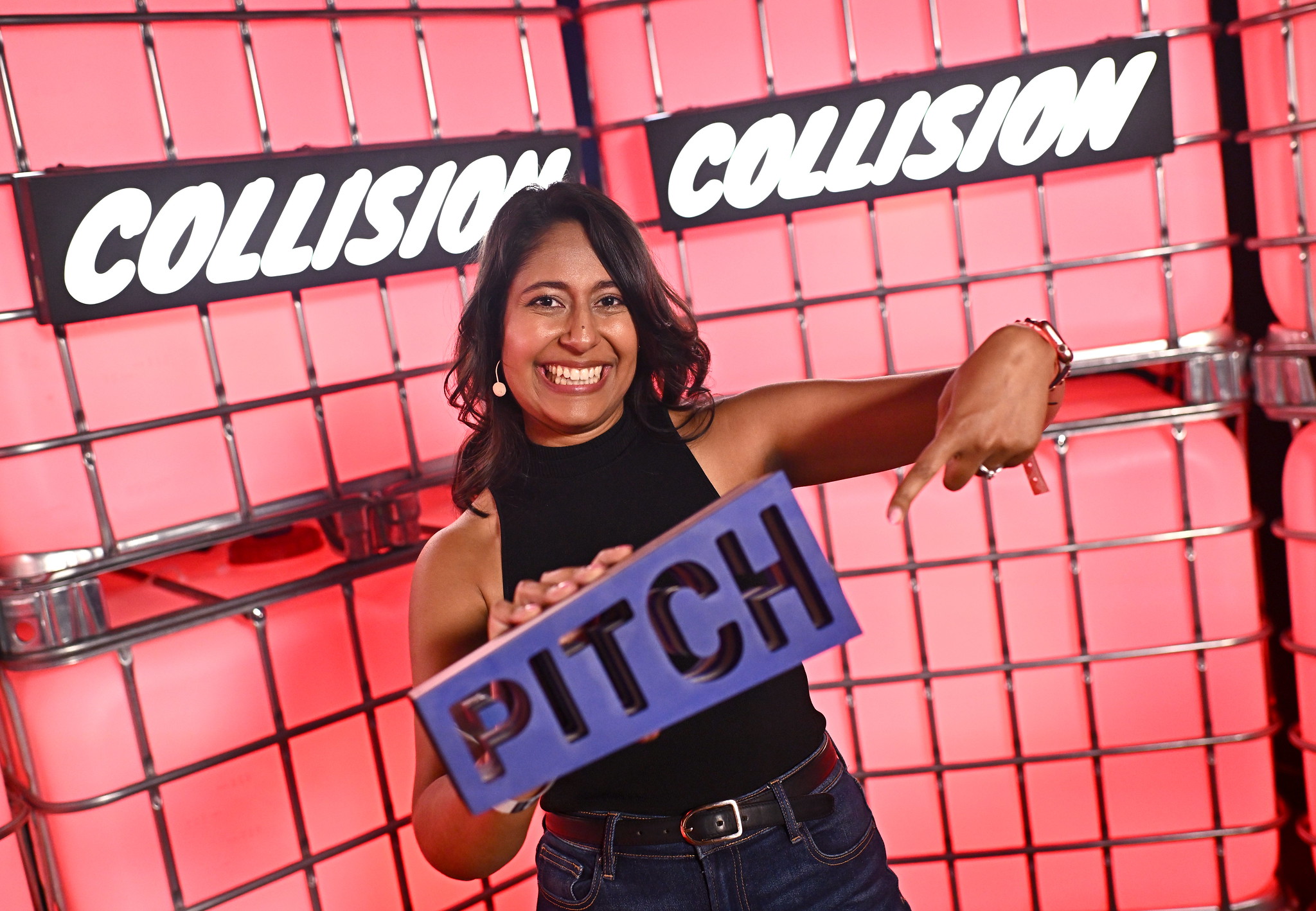 PITCH winner Azrah Manji-Savin, Syzl, with the PITCH trophy backstage at Centre Stage during day three of Collision 2023 at Enercare Centre in Toronto, Canada